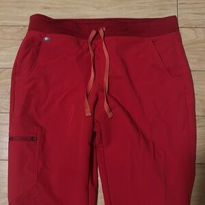 Figs jogger pants color red gently used size medium